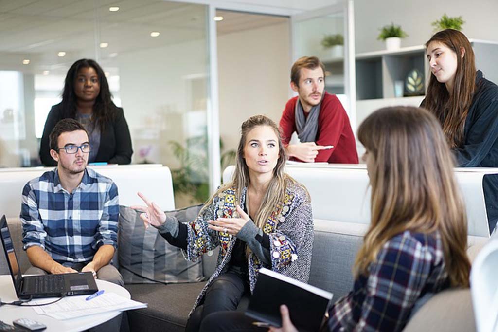 Group of co-workers discussing a project.